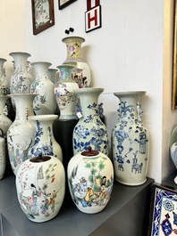 Three Chinese celadon-ground blue and white vases and two famille rose jars, 19/20th C.