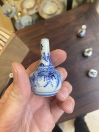 Dertien Chinese blauw-witte miniatuur vazen met floraal decor, Kangxi