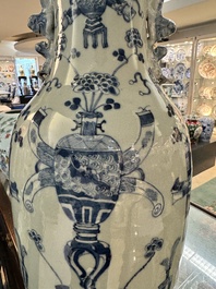 Three Chinese celadon-ground blue and white vases and two famille rose jars, 19/20th C.
