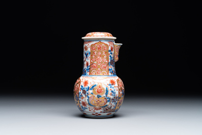 A Chinese English-decorated blue and white jug and cover, Kangxi
