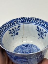 Eleven Chinese blue and white 'crab and fish' cups and saucers, Kangxi mark, Guangxu