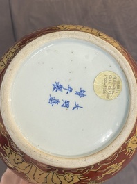 A Chinese cream-glazed vase and two 'dragon' vases, Jiajing and Wanli mark, 19/20th C.