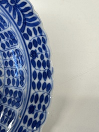 Eleven Chinese blue and white 'crab and fish' cups and saucers, Kangxi mark, Guangxu