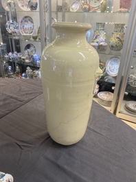 A Chinese cream-glazed vase and two 'dragon' vases, Jiajing and Wanli mark, 19/20th C.