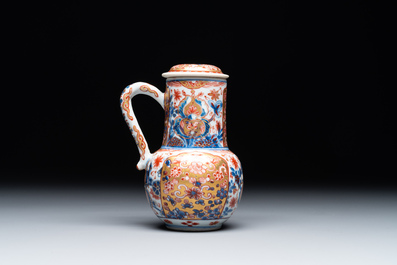 A Chinese English-decorated blue and white jug and cover, Kangxi
