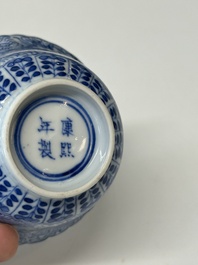 Eleven Chinese blue and white 'crab and fish' cups and saucers, Kangxi mark, Guangxu