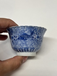 Eleven Chinese blue and white 'crab and fish' cups and saucers, Kangxi mark, Guangxu