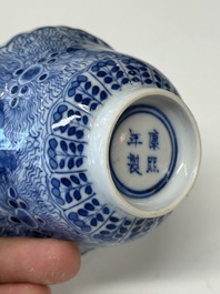 Eleven Chinese blue and white 'crab and fish' cups and saucers, Kangxi mark, Guangxu