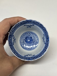 Eleven Chinese blue and white 'crab and fish' cups and saucers, Kangxi mark, Guangxu