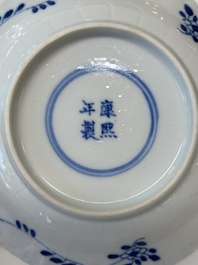 Eleven Chinese blue and white 'crab and fish' cups and saucers, Kangxi mark, Guangxu