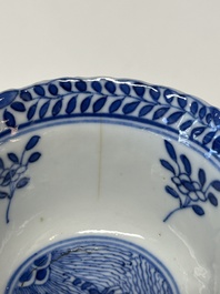 Eleven Chinese blue and white 'crab and fish' cups and saucers, Kangxi mark, Guangxu