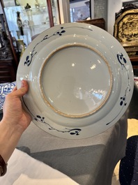 Four Chinese blue and white dishes with floral design, Kangxi/Yongzheng