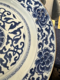 Four Chinese blue and white dishes with floral design, Kangxi/Yongzheng