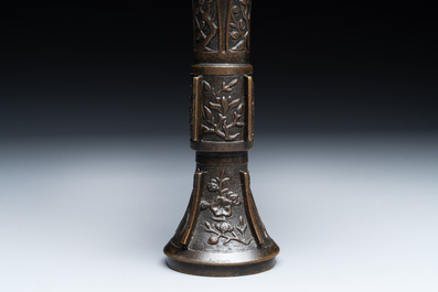 A fine and rare Chinese bronze vase with floral design in the style of Hu Wenming 胡文明, 'gu 觚', Ming