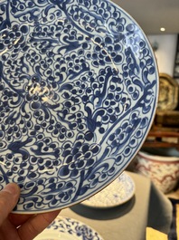 Four Chinese blue and white dishes with floral design, Kangxi/Yongzheng