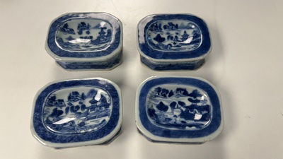 Five Chinese blue and white salts and a sprinkler with copper mounts, Kangxi/Jiaqing