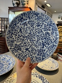 Four Chinese blue and white dishes with floral design, Kangxi/Yongzheng