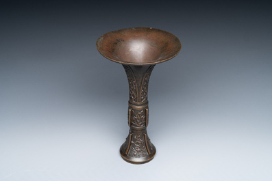 A fine and rare Chinese bronze vase with floral design in the style of Hu Wenming 胡文明, 'gu 觚', Ming
