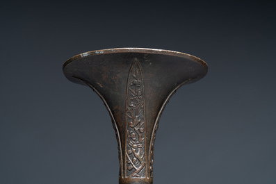 A fine and rare Chinese bronze vase with floral design in the style of Hu Wenming 胡文明, 'gu 觚', Ming