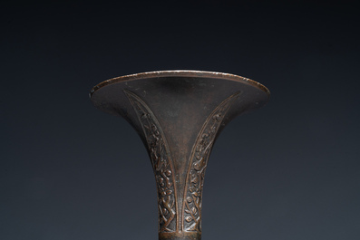 A fine and rare Chinese bronze vase with floral design in the style of Hu Wenming 胡文明, 'gu 觚', Ming