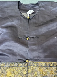 A Chinese dark blue silk overcoat with gold thread embroidered 'rank badges' with wild geese, 19th C.