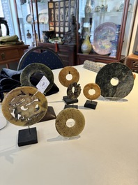 A varied collection of 'bi' discs and jade pendants, China, 1st C. B.C. and earlier