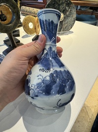 Two pairs of Japanese blue and white vases with figures in a landscape, Edo, 17th C.