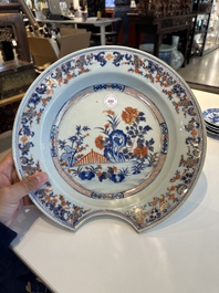 Four Chinese blue and white cups and saucers and a Chinese Imari-style shaving bowl, Kangxi Qianlong