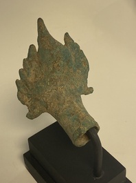 A various collection of bronze khmer palanquin hooks, a bell and a dagger, Angkor Wat periode, Thailand, 12th C.