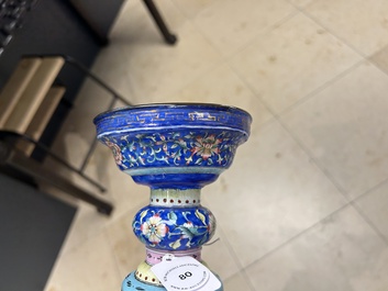A large Chinese Canton enamel blue-ground 'shou' candlestick, Qianlong/Jiaqing