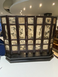 A Chinese seven-fold wooden table screen with painted marble plaques, 19th C.