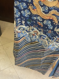A Chinese gold thread embroidered blue-ground silk 'dragon' robe, 19th C.