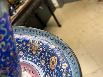 A large Chinese Canton enamel blue-ground 'shou' candlestick, Qianlong/Jiaqing