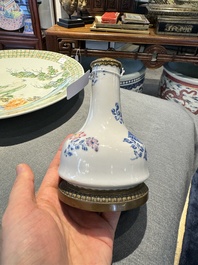 A Chinese famille rose vase with gilt bronze mounts, Escalier de Cristal, Paris, Yongzheng