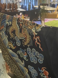 A Chinese gold thread embroidered blue-ground silk 'dragon' robe, 19th C.