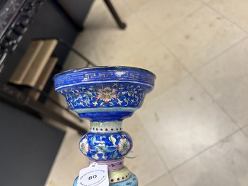 A large Chinese Canton enamel blue-ground 'shou' candlestick, Qianlong/Jiaqing