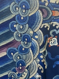A Chinese gold thread embroidered blue-ground silk 'dragon' robe, 19th C.