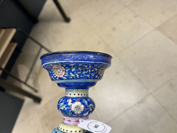 A large Chinese Canton enamel blue-ground 'shou' candlestick, Qianlong/Jiaqing
