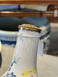 A Chinese famille rose vase with gilt bronze mounts, Escalier de Cristal, Paris, Yongzheng