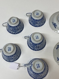 Five Chinese blue and white cups and four saucers with boys carrying a vase, Kangxi mark, Guangxu