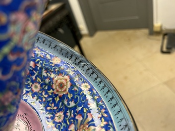 A large Chinese Canton enamel blue-ground 'shou' candlestick, Qianlong/Jiaqing
