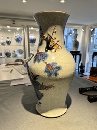 A Chinese blue, white and copper-red Nanking crackle-glazed vase, 19th C.