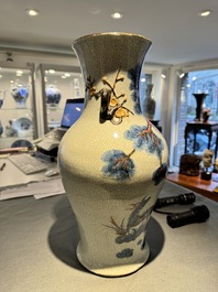 A Chinese blue, white and copper-red Nanking crackle-glazed vase, 19th C.