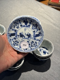 Eight Chinese blue and white 'kite flying boys' cups and saucers, Yongzheng