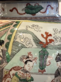 Two Chinese famille verte covered vases on wooden stands, 19th C.