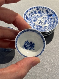 Four Chinese blue and white miniature cups and saucers, butterfly mark, Kangxi