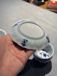 Eight Chinese blue and white 'kite flying boys' cups and saucers, Yongzheng