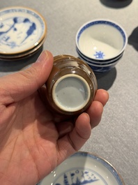 12 Chinese blue and white cups and 13 saucers, including capucin-brown glazed, Kangxi/Qianlong