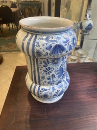 A large Italian blue, white and manganese albarello drug jar inscribed Charitas, probably Savona, dated 1767