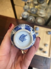 Fourteen Chinese blue and white miniature vases with floral design, Kangxi